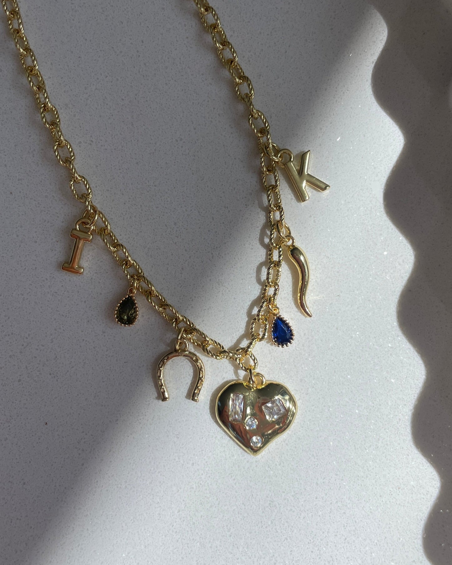 Studio Valli - Custom Charm Bracelets & Necklaces - build your own custom charm necklace - choose your charms - bows, animals, shells, lucky, smiley face, star & moon - New Zealand & Australia